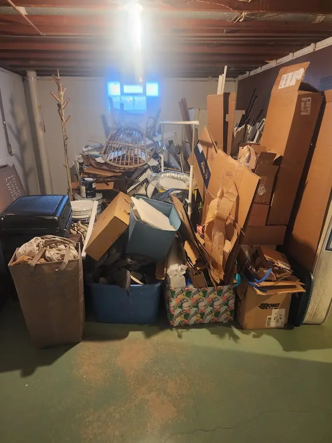 Roll-off dumpster container at job site for Concrete Dumpster Rental in Overisel